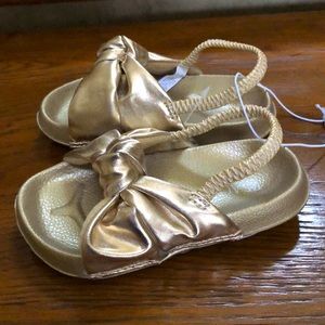 New The Children’s Place girls gold shoes.  Size 8.  Slip on/elastic heel strap.